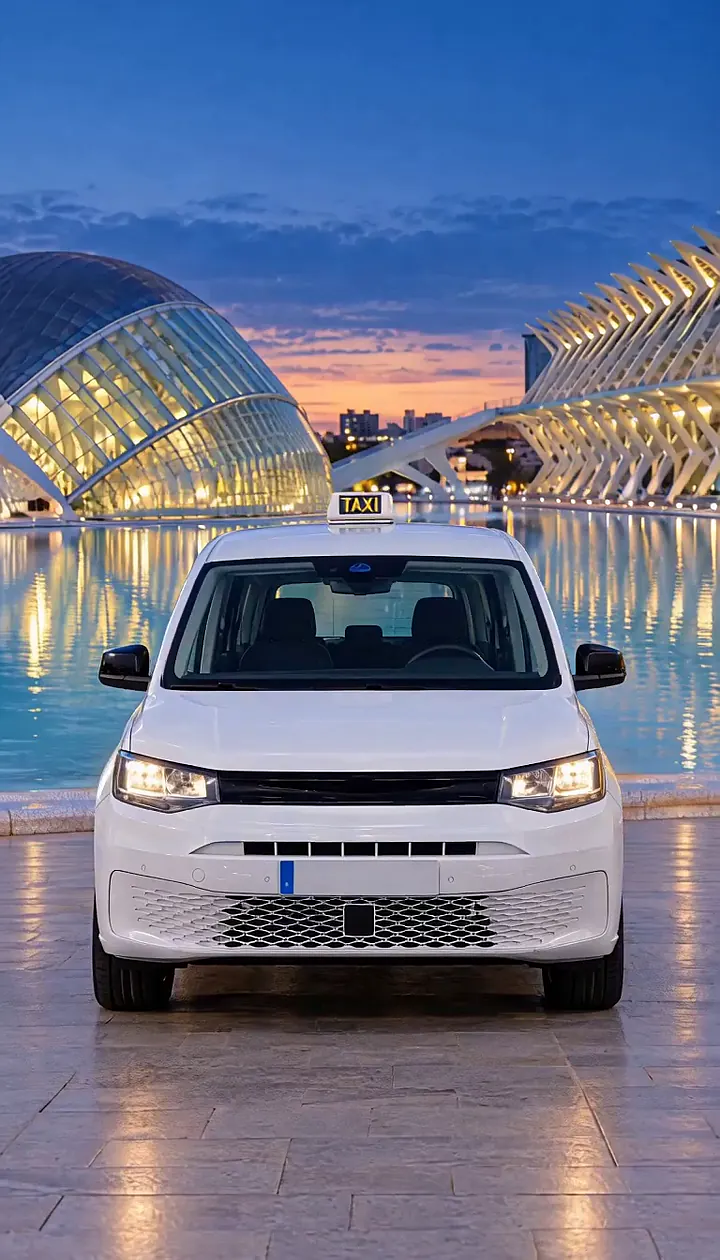 Furgoneta taxi JC Taxi Valencia frente a la Ciudad de las Artes y las Ciencias